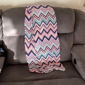 Long fitted skirt. Super cute and comfortable! Lightly worn.